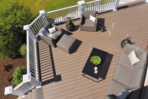 An overhead view of a beautiful deck with white railing.